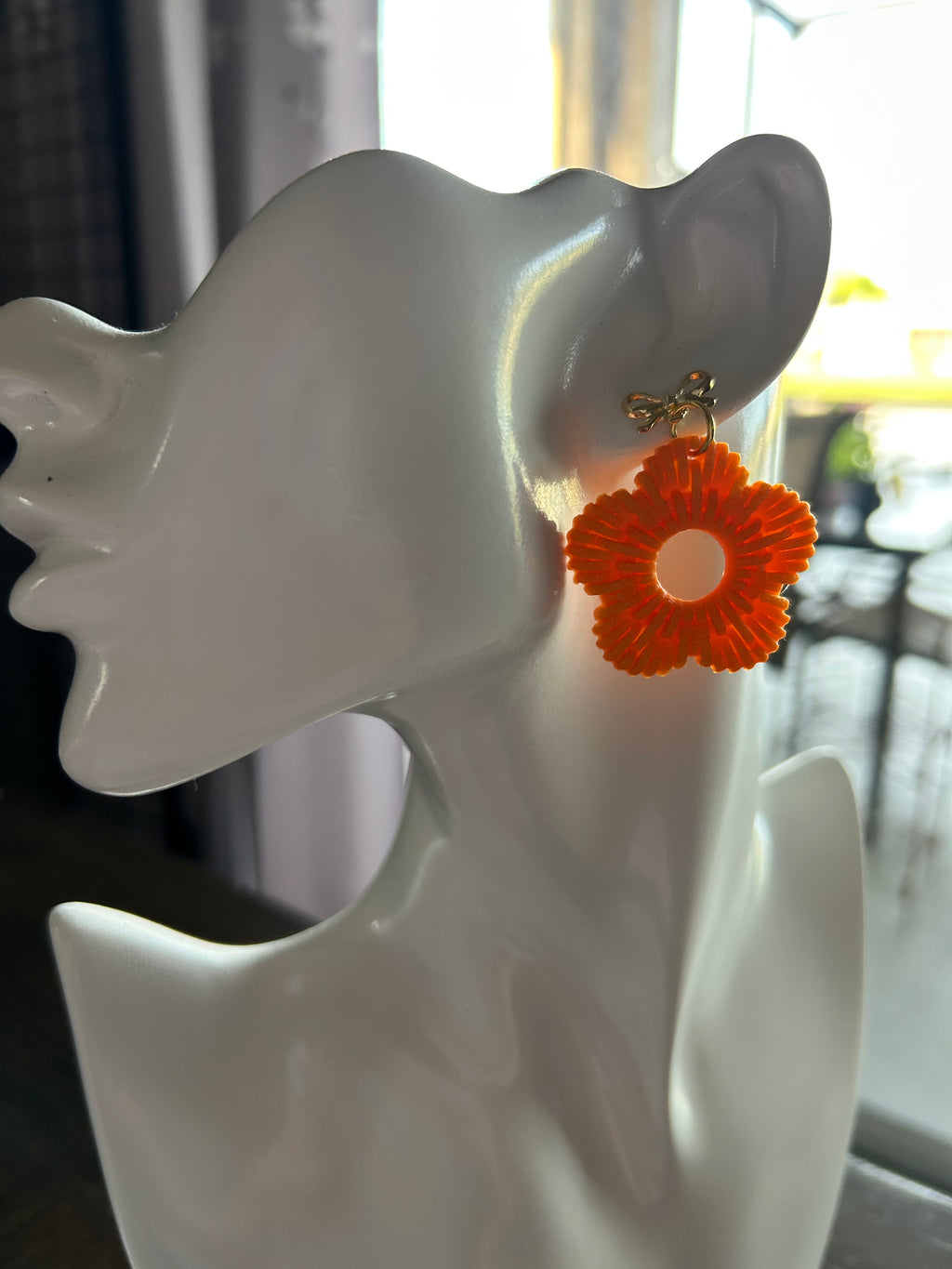Bright orange dangles